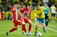 Las Palmas cản bước tiến lên ngôi đầu của Atletico 