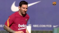 Messi lần đầu trở lại sân tập Barca